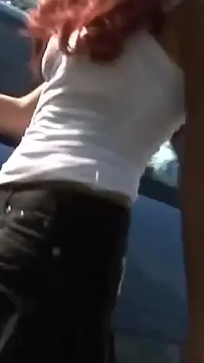 Sexy Redhead Girl Flashing Her Hot Legs in a Park