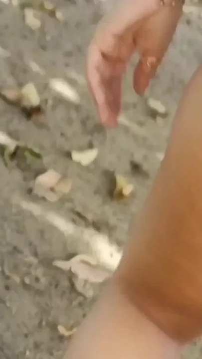 Hot girl showing off in shorts on the street Clip 1