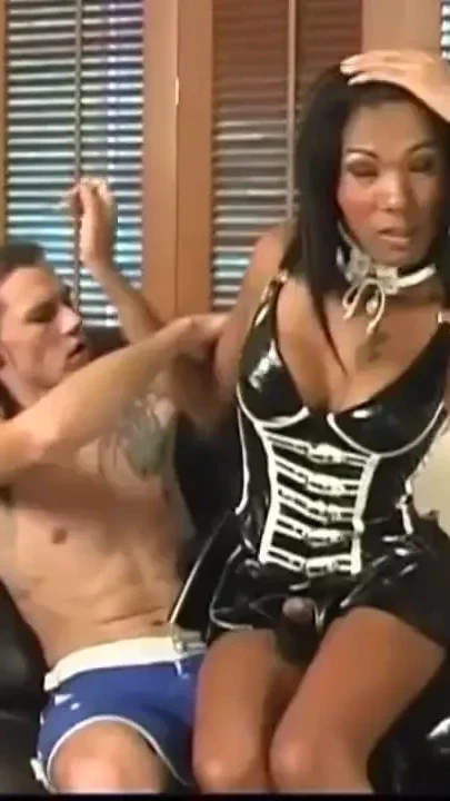 Black sexy shemale takes a big white cock in the ass