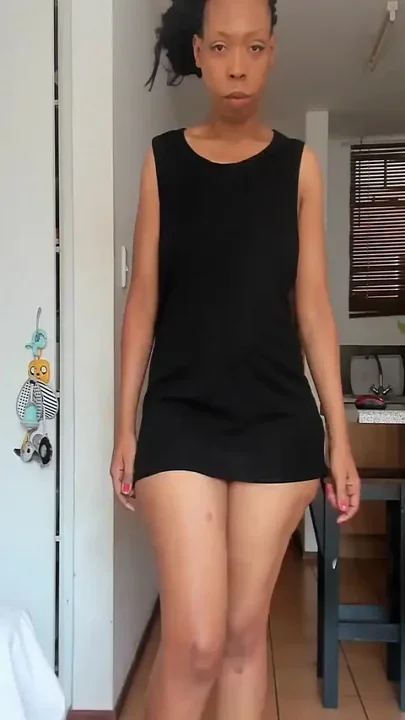 Squeezing booty in black panties