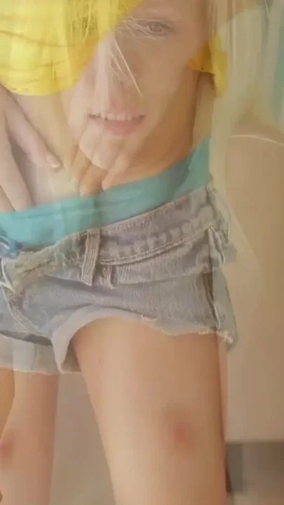 Adorable blonde teen is toying her pussy