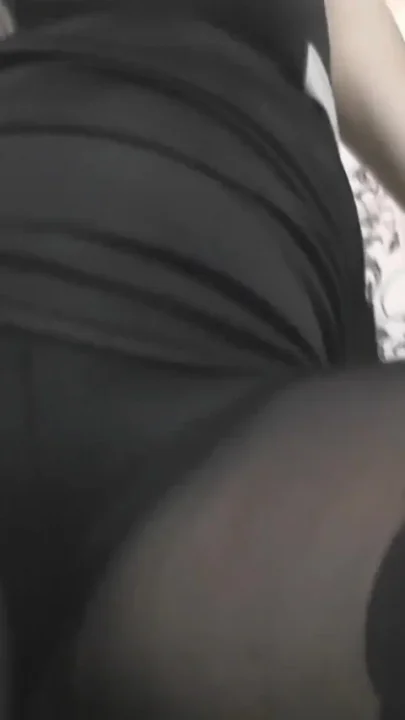 Footjob in thick black tights 