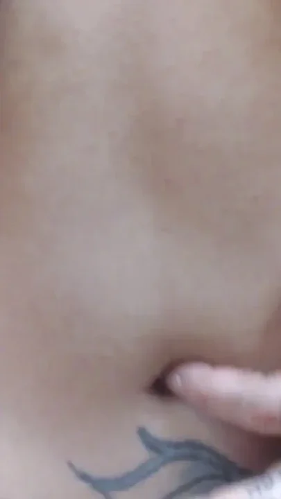 Belly button stretching fingering