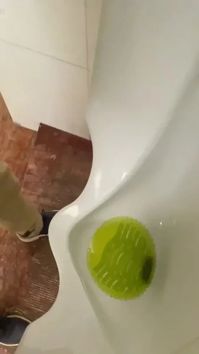Amateur Redhead Guy Caught Pissing in a Public Toilet's Urinal - He Then Quickly