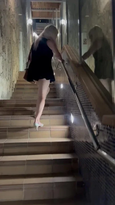 Astrid on the stairs on holiday in heels