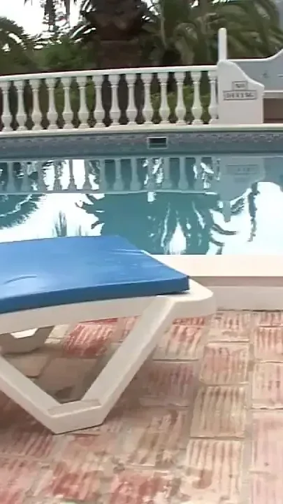 Amazing Blonde Lesbians Play with a Dildo Poolside