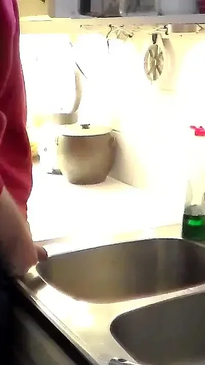 John Is Pissing in the Kitchen Sink
