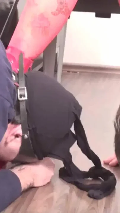 Redhead mistress using her two slaves