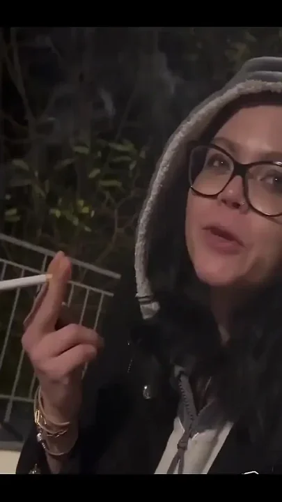 Smoking at Cold Night After Shooting