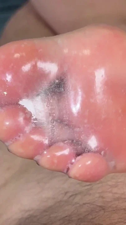 Used and cum filled condom tease footjob Clip 1