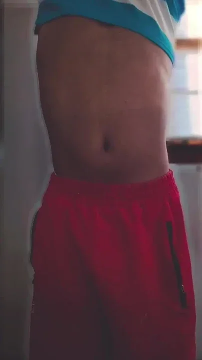 Taking off my clothes to reveal my hard cock