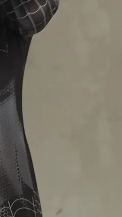 SPIDERMAN COSPLAY GIRL IS TRYING ON HER COSTUME AND EVEN GETS STUNG UNTIL IT