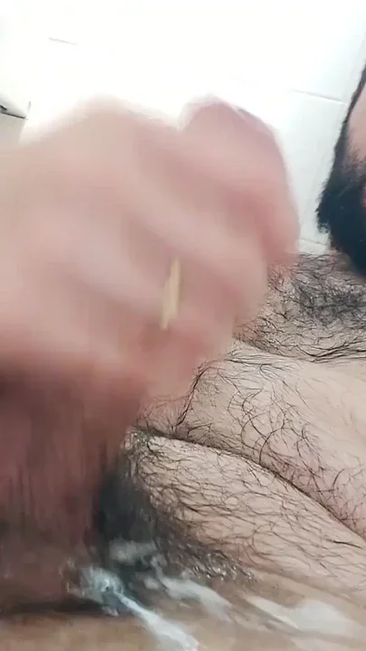 UNCUT HUNK CUMS IN THE BATHTUB Clip 1