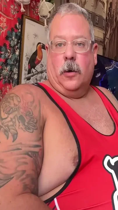 Giant Man in Wrestling Uniform Has Massive Release Hands Free
