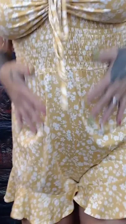 Ripping up yellow summer suit
