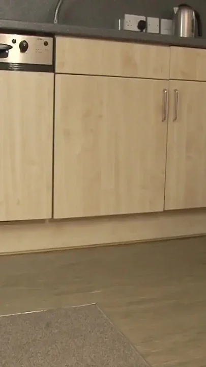 Blonde MILF Sophie May Fingers Her Pussy in the Kitchen