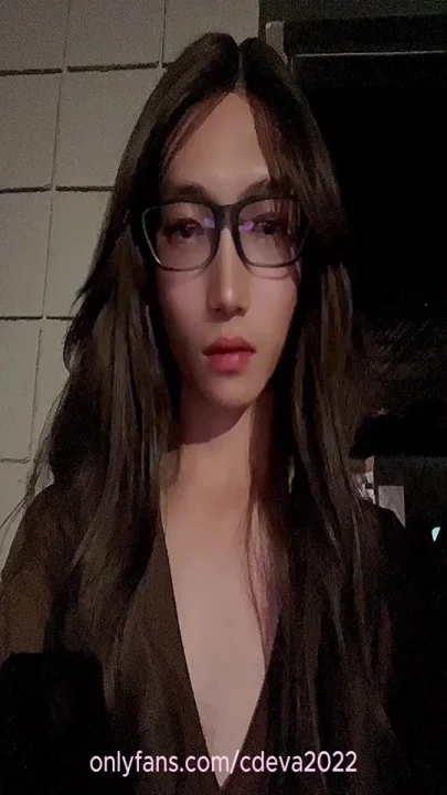 Asian Sissy Eva flashing by the street in tan pantyhose and night dress