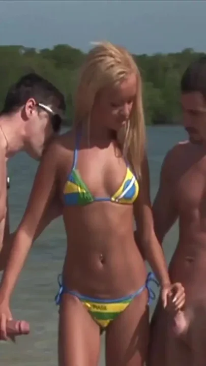 Beautiful teen gets double penetrated in water