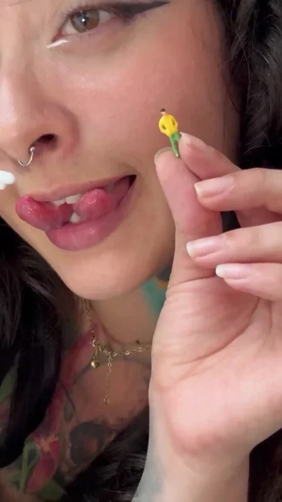 Giantess Shoves a Shrunken Man up Her Nose