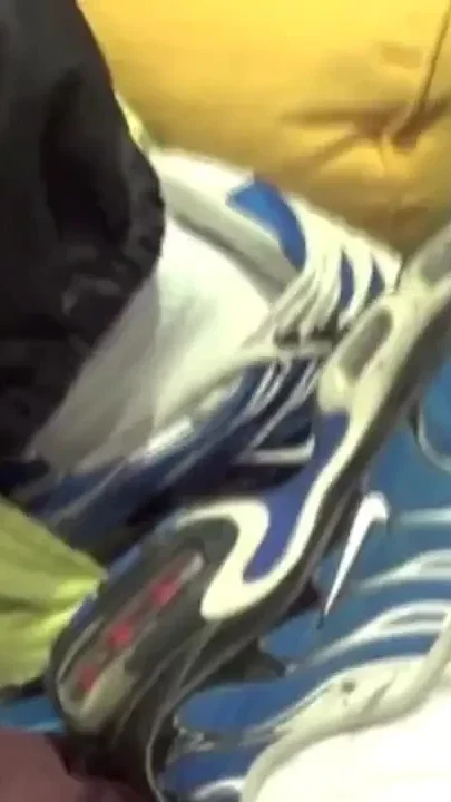 Fuckd insneaker by his friend in the sofa