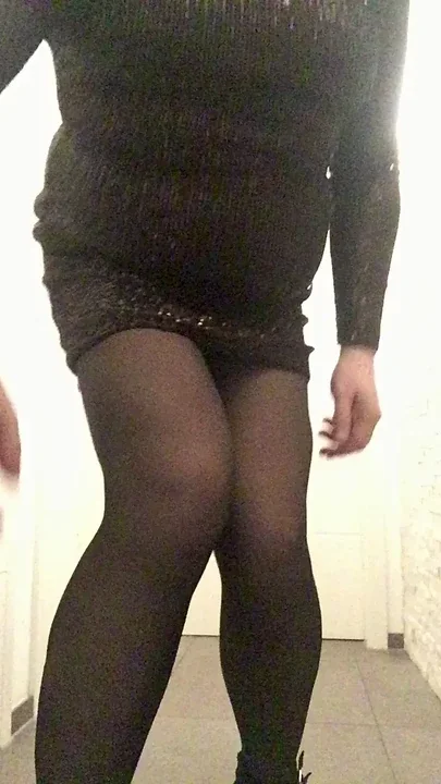 Nicki crossdress in sexy festive dress with black tights looking for a sexy date