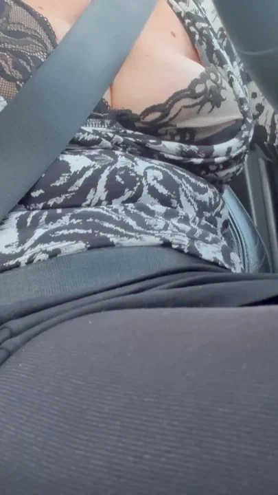 Elegant mature wife drives in the morning on her way to the office Clip 1