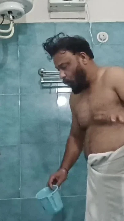 Indian Nude Daddy Enjoying a Hot Shower and Showing off His Wet Body