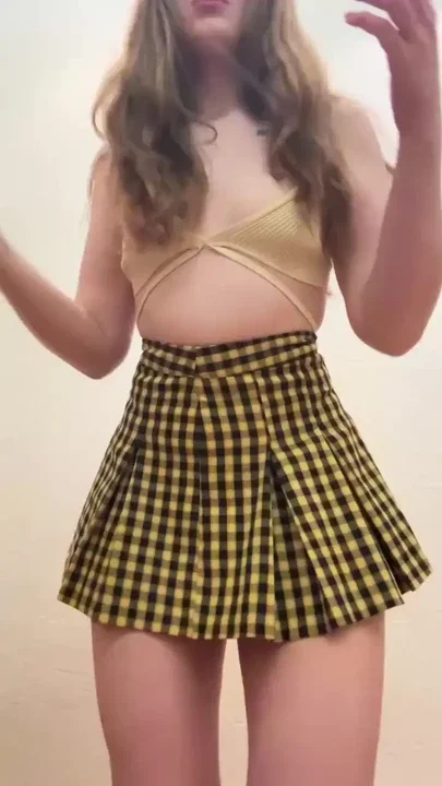the baby became an adult and showed off her tits and ass under a short skirt
