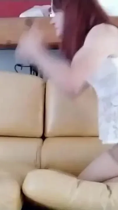Sexy Red Head Crossdresser Shemale in White Lingerie in Sheer Stockings and High