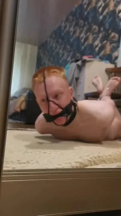 Hogtied Barefoot gagged guy with cumshot on his feet Clip 1