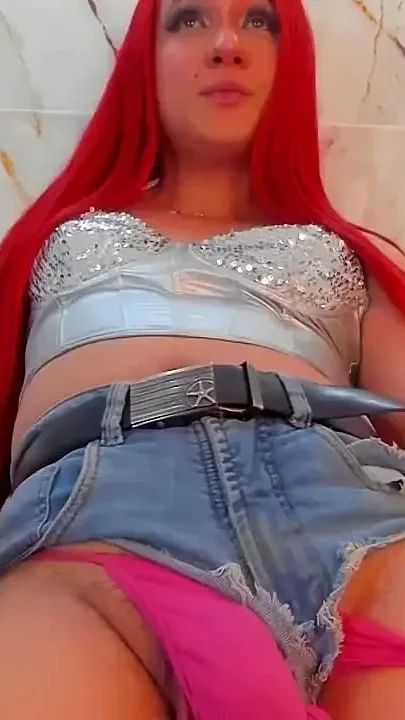 Redhead with a Big Bulge in Her Pink Thong