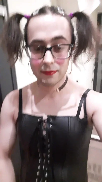 Sissyslut in front of the hotel entrance