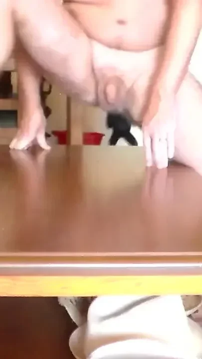 John is peeing all on the sofa table