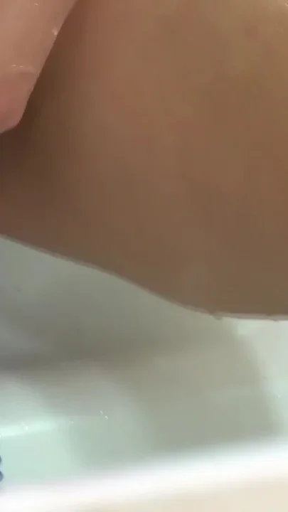 Beautiful and sensual as well as busty Nina StrongHold plays with her water