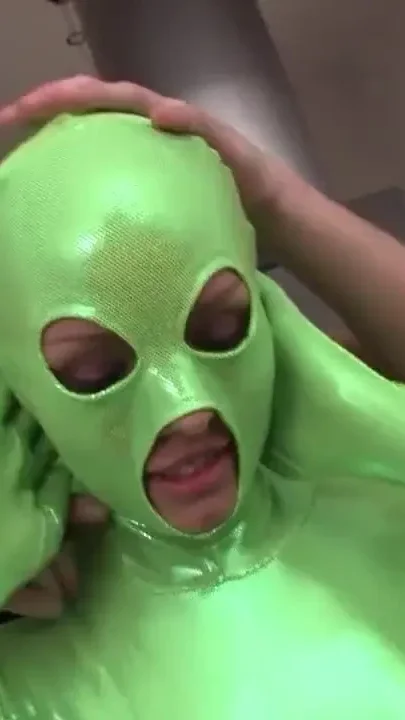 Crazy bitch in latex green costume takes a big hard cock