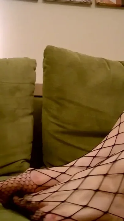 Trans beauty sexy fishnets loves playing with her feet