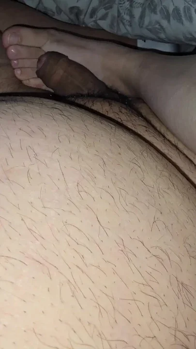 Step mom lets step son fuck her feet while sitting in bed Clip 1