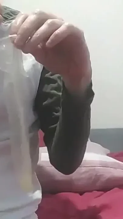 Sammy Andrews fingering himself with cum from a used condom