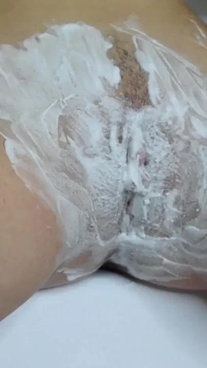 Shaving a hairy pussy with a trimmer and a razor with shaving foam Runway Closeup Clip 1