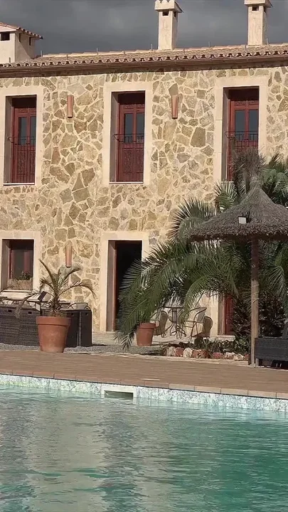 Hot Ilona Lies by the Pool and Rubs Her Pussy and Dildo with Oil