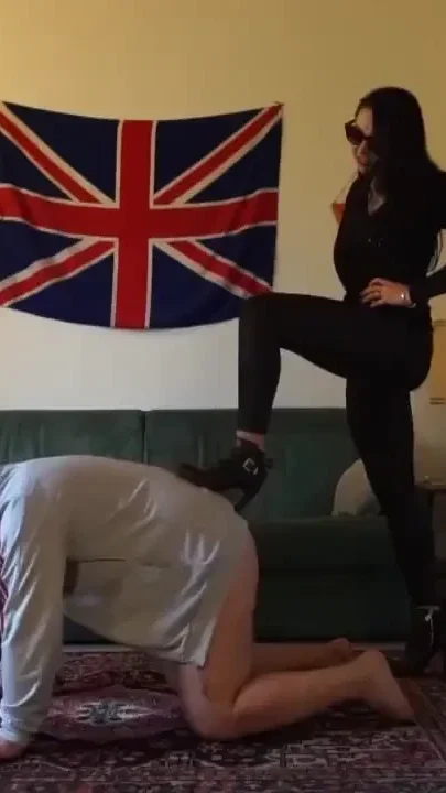 Masked slave gets punished from three femdom chicks