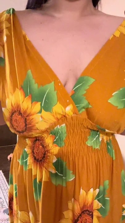 sunflower dress gets pulled down releasing saggy breasts