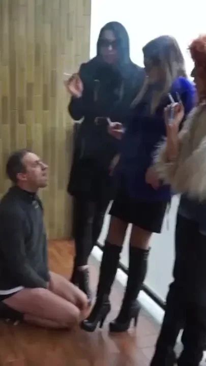 Three femdom chicks smoking and using him as ashtrey