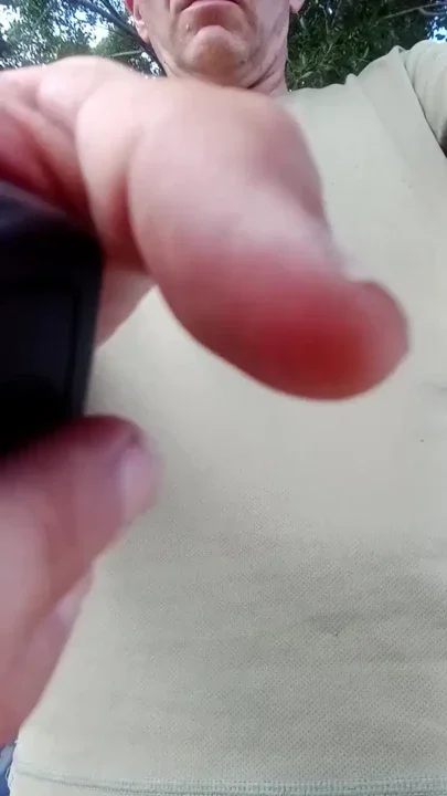 Public freeballing in transparent shorts watching traffic with my cock out Clip 1