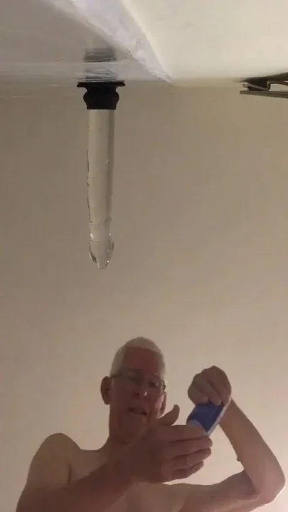Close up View From Below Riding a Large Glass Cock
