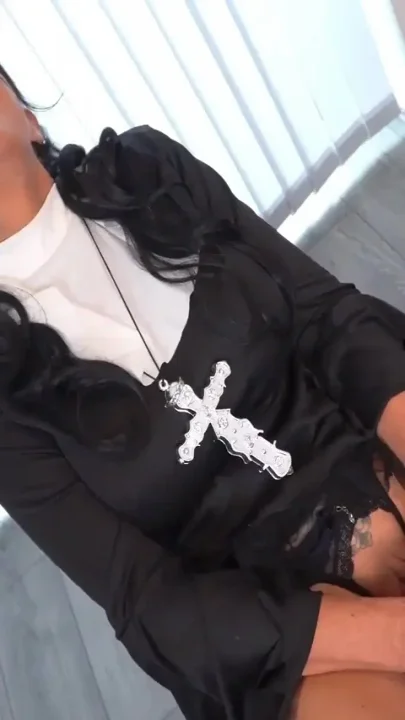 Naughty nun with huge pussy lips