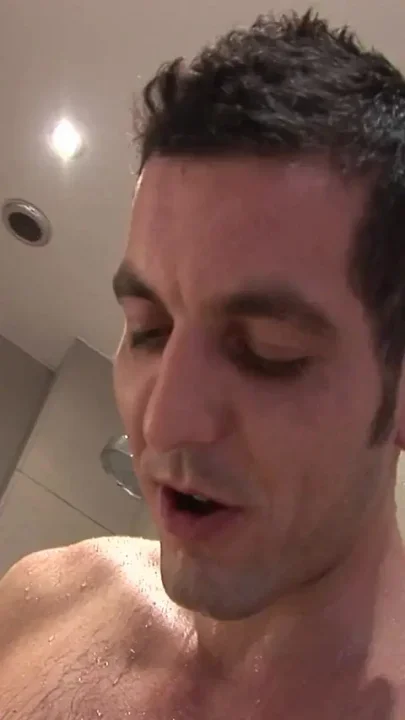 Kinky sluts sharing a massive cock under the shower