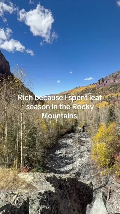 Rich because I spent leaf season in the Rockies travel explore mountains forest waterfall