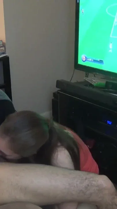 Double Blowjob While He Plays FIFA Clip 2