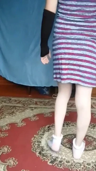 Lovely Shemale Standing in Doorway with Soft Eyes